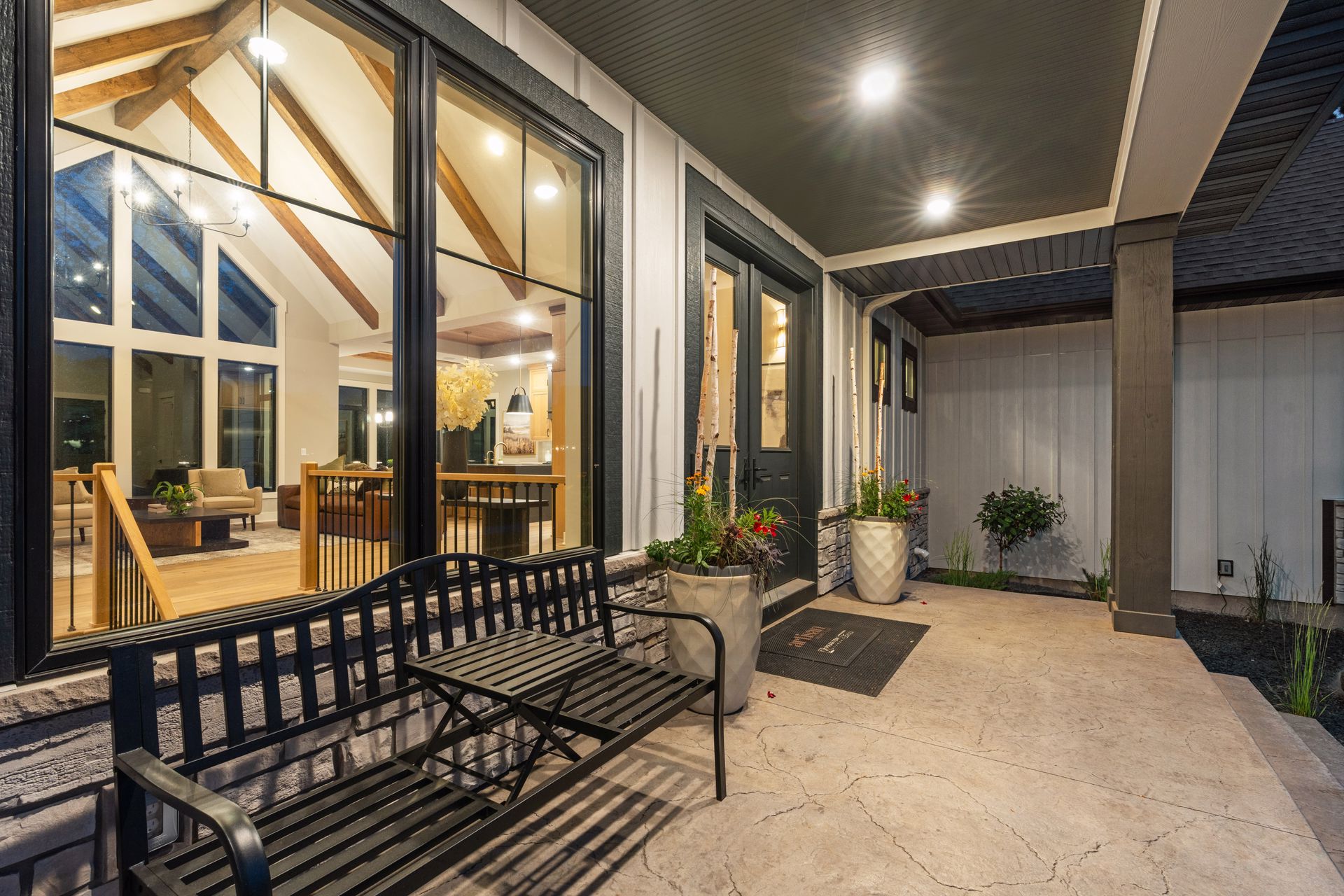 Front porch illuminated at dusk